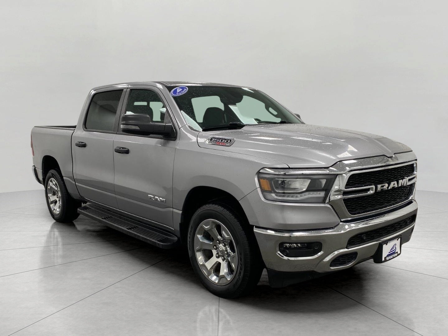 2023 RAM 1500 Big Horn 4x4 Crew Cab 5'7 Box in Billet Silver Metallic Clearcoat — front three-quarter view