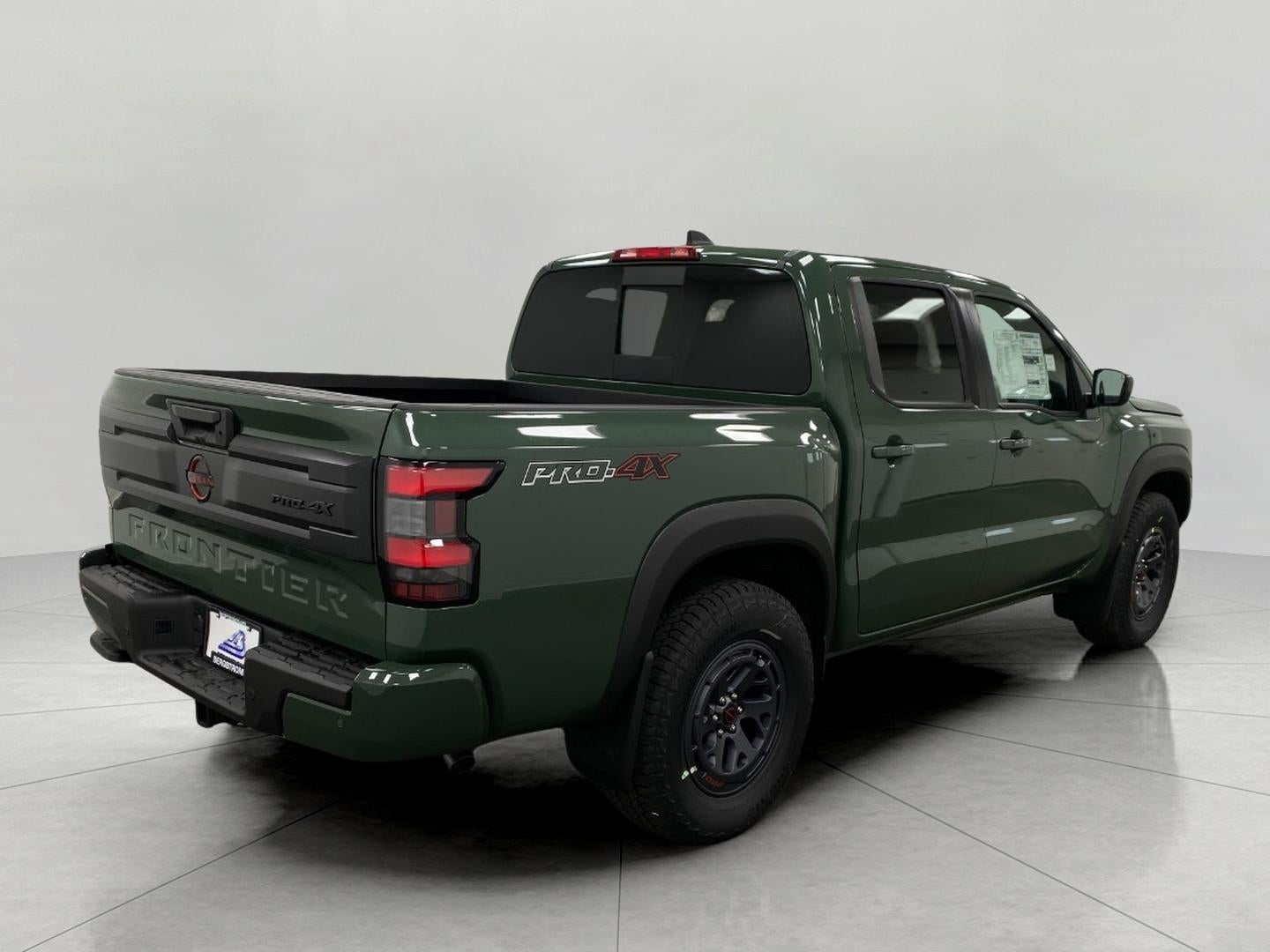 2026 Nissan Frontier — rear three-quarter view