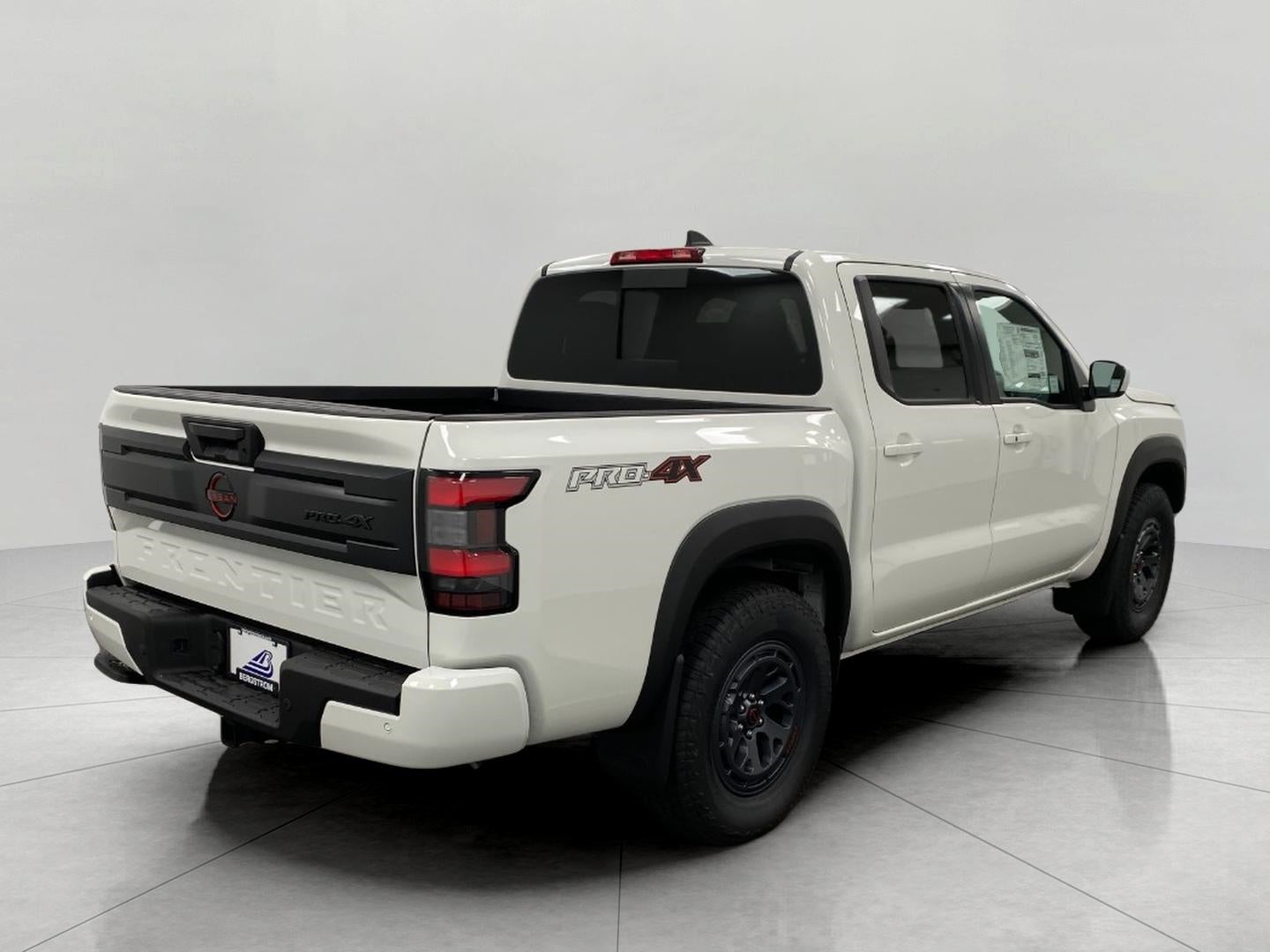 2026 Nissan Frontier — rear three-quarter view