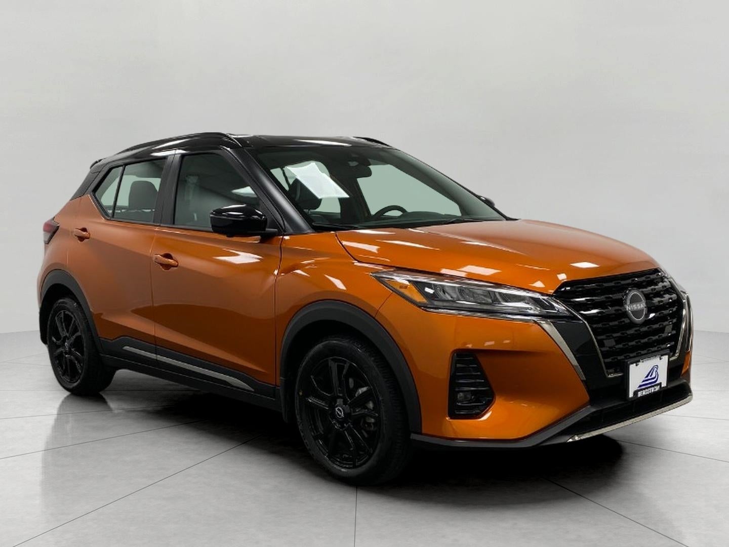 2024 Nissan Kicks SR in Monarch Orange Super Black — front three-quarter view