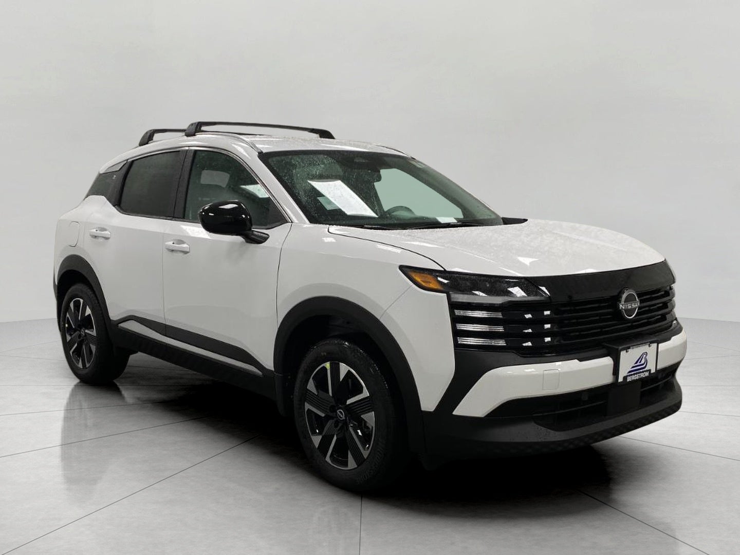2026 Nissan Kicks SV in Fresh Powder — front three-quarter view