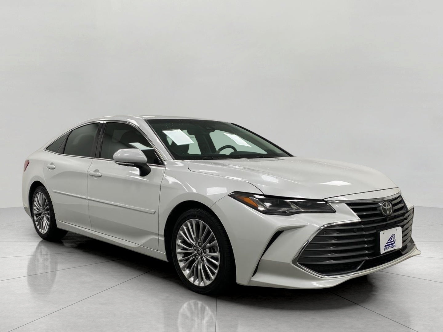 2020 Toyota Avalon Limited in Wind Chill Pearl — front three-quarter view
