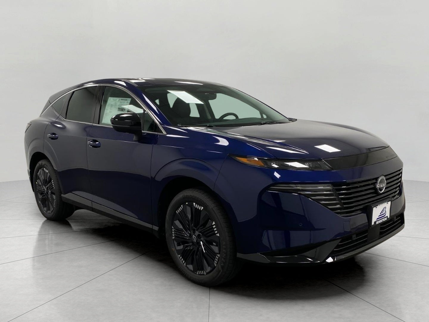 2026 Nissan Murano Platinum in Deep Ocean Blue Pearl — front three-quarter view