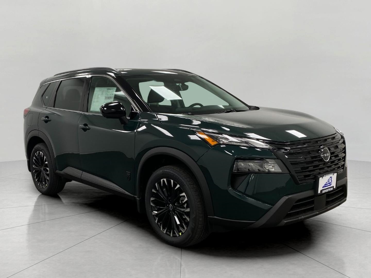 2026 Nissan Rogue Dark Armor in Obsidian Green Pearl — front three-quarter view
