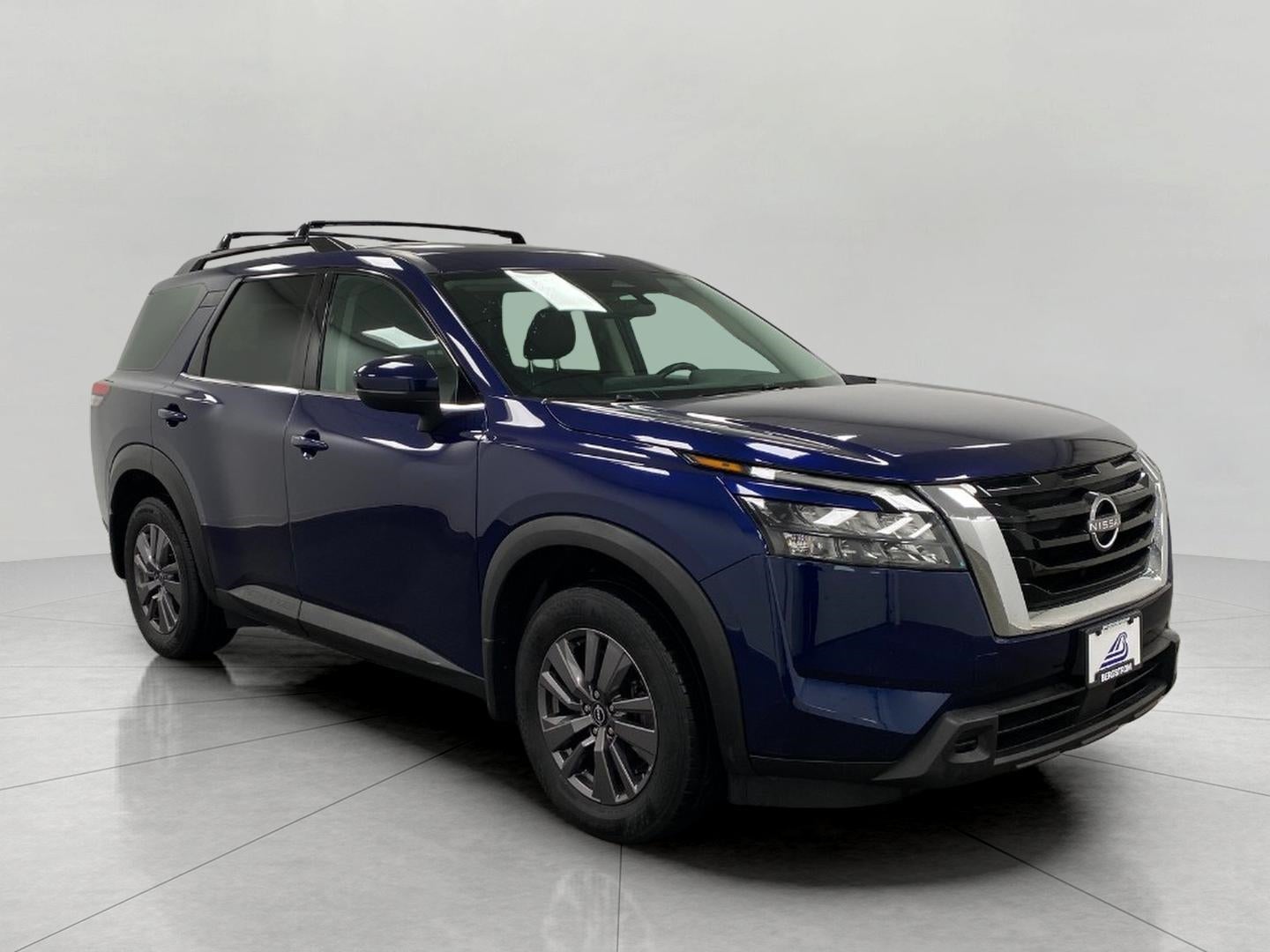 2023 Nissan Pathfinder SV in Deep Ocean Blue — front three-quarter view